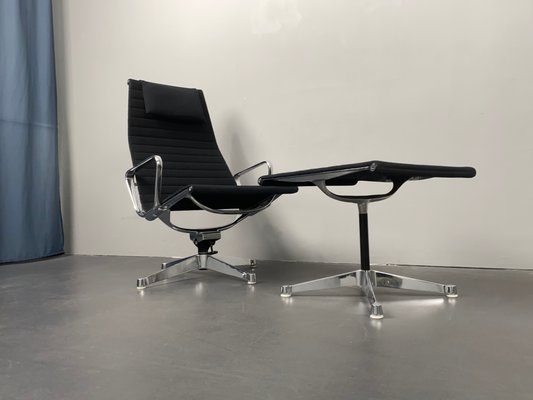 Aluminum EA 124 Rotating Armchair with Ea 125 Footstool by Charles & Ray Eames for Herman Miller from Vitra, Germany, 1970s, Set of 2-YZD-1437903