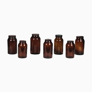 Amber Glass Jars with Hard Plastic Caps, 1960s, Set of 7-RAQ-486159