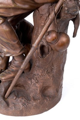 Anatole J. Guillot, Depicting Seated Woodcarver with Dog, Bronze Sculpture-RCE-1099681