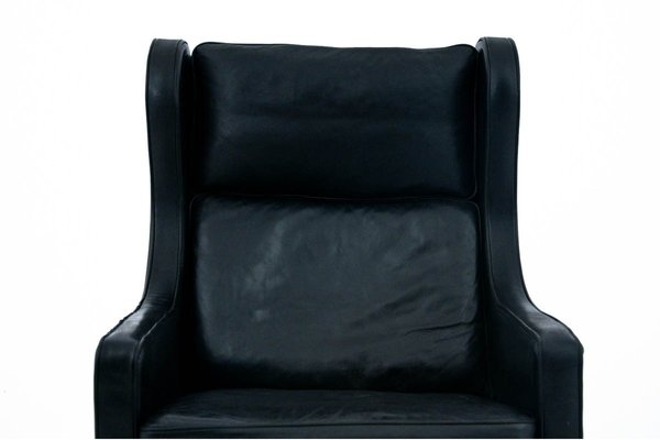 Black Leather Wingback Armchair, 1950s-BXB-744311