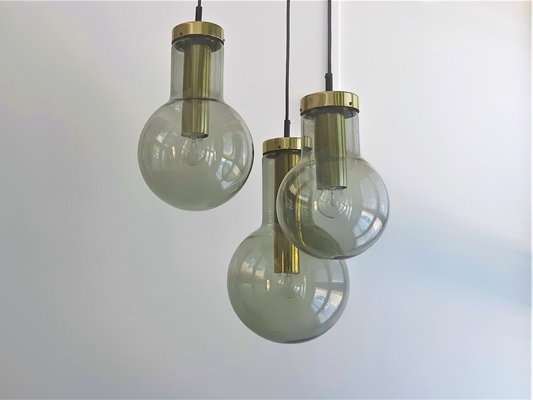 Chandelier with 3 Glass and Brass Maxi Globe Pendant Lamps from Raak, the Netherlands, 1960s-NV-990945