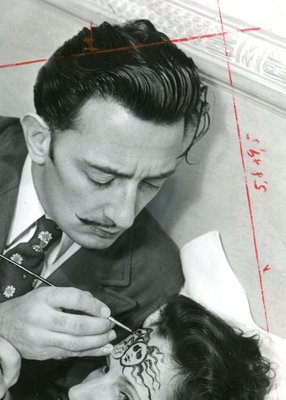 Dali is Painting Medusa's Head on Galas Forehead, 1955-DYV-701005