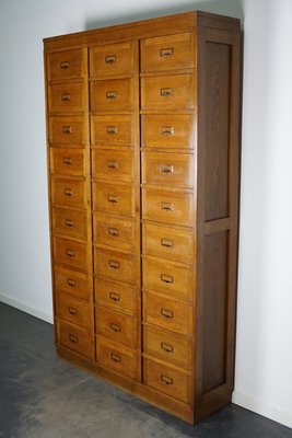 Dutch Oak Apothecary Filing Cabinet with Folding Doors, 1930s-XO-1158539