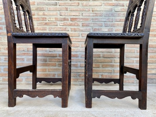 Early 20th Century Spanish Carved Chairs with Wood Seat, 1890s, Set of 2-NOU-1730514