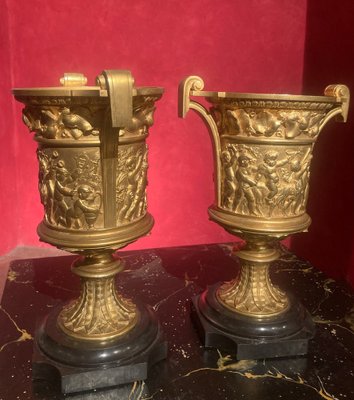 French 18th Century Louis XVI Ormolu Vases with Handles and Relief Putto on Black Belgian Marble Bases, Set of 2-AXE-1720640