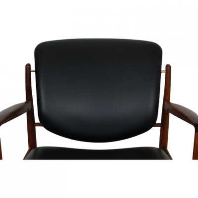 French Lounge Chair in Black Leather and Walnut by Finn Juhl-MTD-2028743