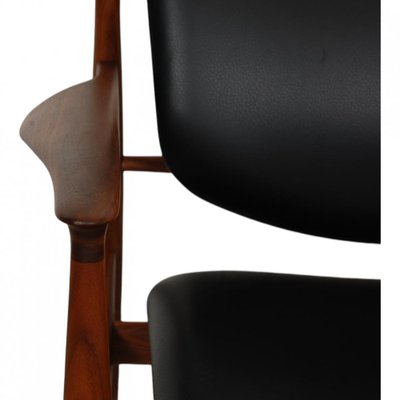 French Lounge Chair in Black Leather and Walnut by Finn Juhl-MTD-2028744