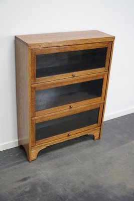 German Oak Bookcase with Folding Doors in Style of Globe Wernicke, 1930s-XO-1320887