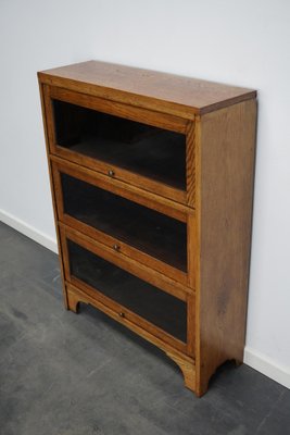 German Oak Bookcase with Folding Doors in Style of Globe Wernicke, 1930s-XO-1320887