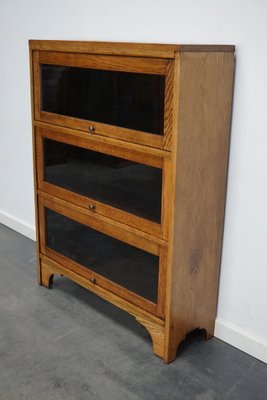 German Oak Bookcase with Folding Doors in Style of Globe Wernicke, 1930s-XO-1320887