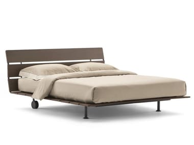 TADAO - Oriental style bed on castors by Flou