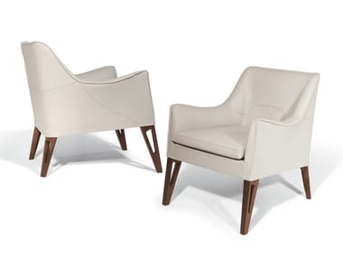 MOBIUS - Leather easy chair with armrests by Giorgetti