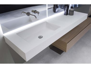 NIDO - Flumood® washbasin with integrated countertop by Antonio Lupi Design