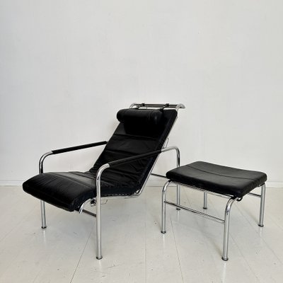 Lounge Chair with Ottoman in Chrome and Black Leather by Gabriele Mucchi for Zanotta, 1980s, Set of 2-FB-2043893