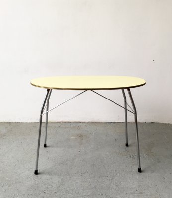 Mid-Century Yellow Formica and Polished Steel Coffee Table with Folding Legs, 1950s-GGK-674530