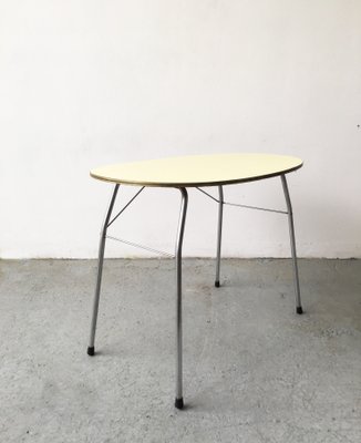 Mid-Century Yellow Formica and Polished Steel Coffee Table with Folding Legs, 1950s-GGK-674530