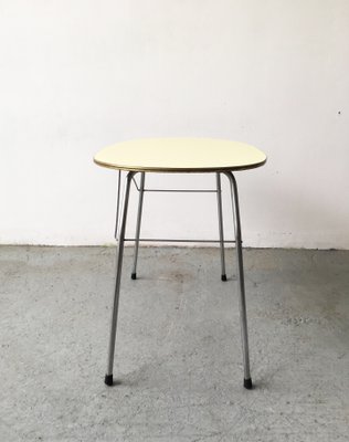 Mid-Century Yellow Formica and Polished Steel Coffee Table with Folding Legs, 1950s-GGK-674530