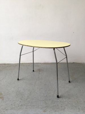 Mid-Century Yellow Formica and Polished Steel Coffee Table with Folding Legs, 1950s-GGK-674530