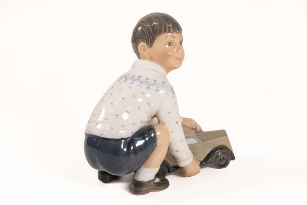 Model 1166 Boy with Car Figurine in Porcelain by Dahal Jensen, Denmark, 1950s-PCO-1813295