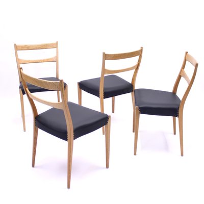 Scandinavian Oak Dining Chairs With Black Leather Seats, 1950s, Set of 4-KQ-787374