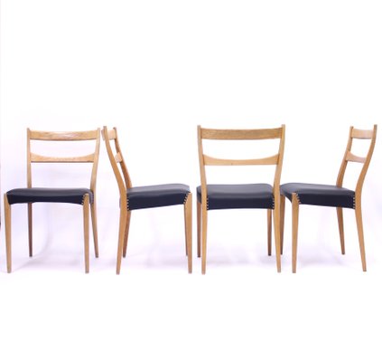 Scandinavian Oak Dining Chairs With Black Leather Seats, 1950s, Set of 4-KQ-787374