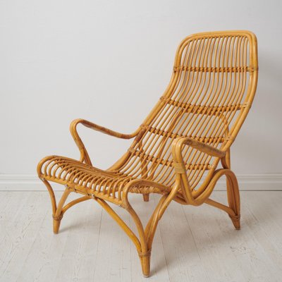 Swedish Modern Rattan Lounge Chairs and Footstool attributed to Bruno Mathsson for Dux, 1970s, Set of 3-MJF-1772916