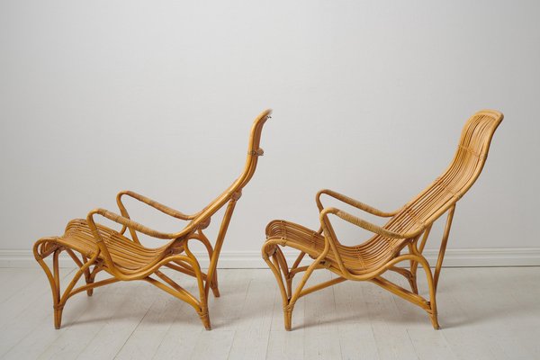 Swedish Modern Rattan Lounge Chairs and Footstool attributed to Bruno Mathsson for Dux, 1970s, Set of 3-MJF-1772916