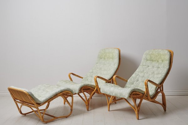 Swedish Modern Rattan Lounge Chairs and Footstool attributed to Bruno Mathsson for Dux, 1970s, Set of 3-MJF-1772916