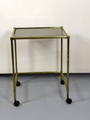 Vintage Brass Side Table On Wheels With Smoked Glass Top-UWE-772518