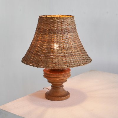 Wabi-Sabi Table Lamp in Turned and Carved Wood with Rattan Shade, 1920s-LPQ-1799946