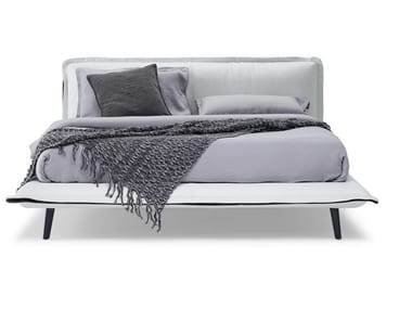 PIUMA - Upholstered fabric double bed by Natuzzi Italia